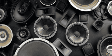 Close-up view of various high-end speakers, showcasing audiophile-grade components. - Supply Chain News