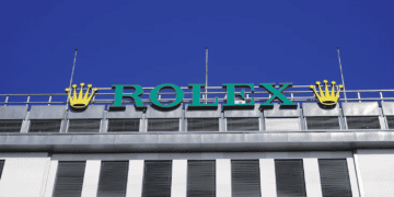 Rolex logo atop a building in Geneva. - Supply Chain News