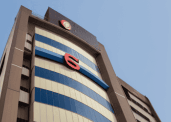 A building with a blue sign on it.