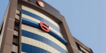 A building with a blue sign on it.