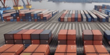 A view of a container dock with many containers, showcasing international exports.