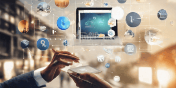 A businessman is Embracing the Evolving Landscape of Fintech through holding a tablet with various icons on it.