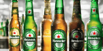 Heineken bottles showcasing the brand's commitment to sustainability and data-driven digital transformation. - Supply Chain News