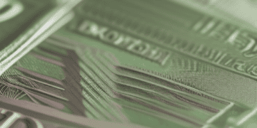 A close up of a stack of green banknotes highlighting the impact of the BOE Rate Cut on Sterling's decline.