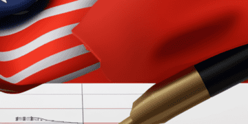 US and China flags with pen signing trade agreement. Global economic impact. - Supply Chain News