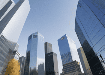 A view of skyscrapers in a city overlooking the bustling financial district, where economic indicators such as interest rates and slowing inflation are closely monitored by the ECB.