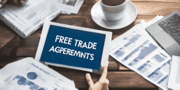 Businesspeople reviewing documents with "Free Trade Agreements" on a tablet at a meeting. - Supply Chain News