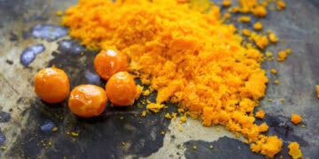 A plate with some Gum Arabic powder on it, representing the crisis in Sudan.