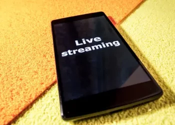 An Indonesian orphanage smartphone encouraging livestreaming for donations.