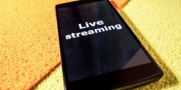 An Indonesian orphanage smartphone encouraging livestreaming for donations.