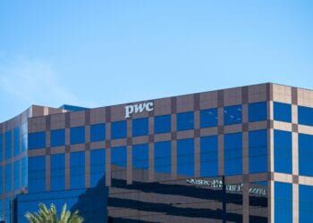 PwC Australia divests its government advisory business leaving only a building with a sign that says "PwC".