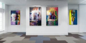 An art gallery showcasing paintings from both China and the US, promoting international art trade despite tariffs.