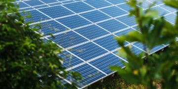 A photo of a Solar Panel in a field producing renewable energy.