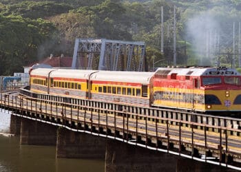 Panama Canal Railway train crossing a bridge. CPKC growth potential. - Supply Chain News