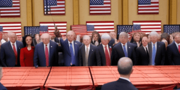 Politicians at a press conference, discussing the U.S. economy's strong Q4 growth and easing inflation. - Supply Chain News