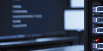 A server rack with Jenkins Servers in front of a monitor, displaying a Vulnerability Alert regarding Remote Code Execution Threat.