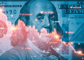 An image of a US dollar bill with an image of a man's face, symbolizing financial prosperity.