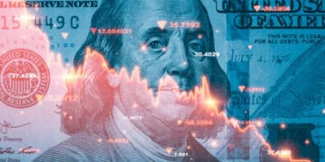 An image of a US dollar bill with an image of a man's face, symbolizing financial prosperity.