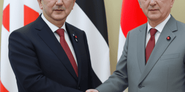 A man in a suit, enhancing security ties between Japan and the UK.