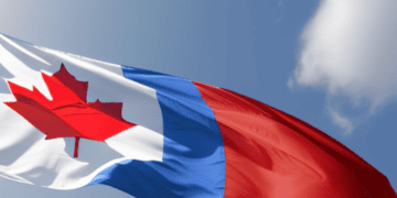 A Canadian flag flying in the sky, without any service limitations or meta threats from Google.