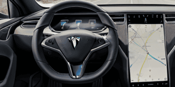 The Tesla Model S dashboard equipped with FSD Beta v12.12, showcasing enhanced autonomous driving capabilities.