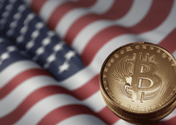 Bitcoin coin against a US flag, illustrating the impact of US inflation data on cryptocurrency markets. - Supply Chain News