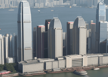 Hong Kong skyline with skyscrapers, including the China Evergrande Group headquarters, during financial crisis. - Supply Chain News