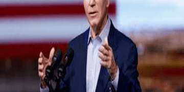 Joe Biden addressing the nation in a powerful speech, with the American flag serving as a backdrop to convey unity and patriotism.