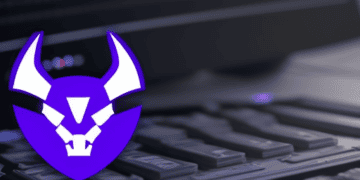 An image of a demon logo on a laptop keyboard showing the importance of patching to mitigate critical vulnerability in GitLab.