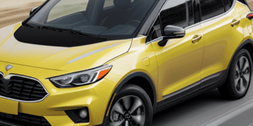 The 2019 Ford Escape, a gas-powered car, is driving down the road.