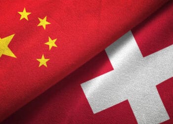 Two flags of China and Switzerland symbolizing visa-free travel.