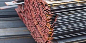 A stacked pile of tarrifed steel bars.