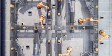 An aerial view of a factory with DHL Supply Chain robots working.