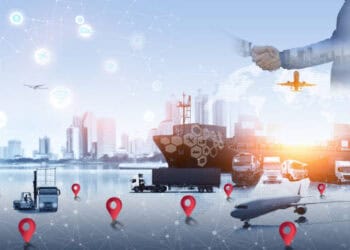 A businessman is holding a hand with a map of a city while making a withdrawal from an H&M store in Myanmar.