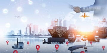 A businessman is holding a hand with a map of a city while making a withdrawal from an H&M store in Myanmar.