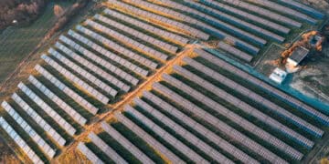 An aerial view of a solar farm by Auxin Solar.
