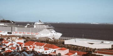 An MSC Cruises ship canceled its April Grand Voyages and is now docked in a port city.