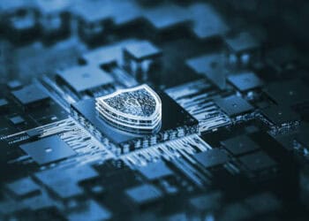 A shield on top of a computer chip, ensuring elevate security.