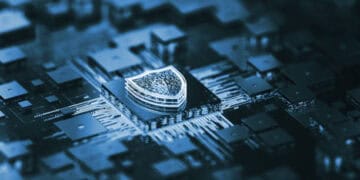 A shield on top of a computer chip, ensuring elevate security.