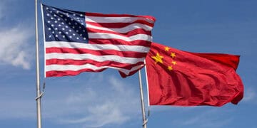 The House Committee assesses changes in U.S.-China trade relations as it closely examines the presence of two American and Chinese flags.