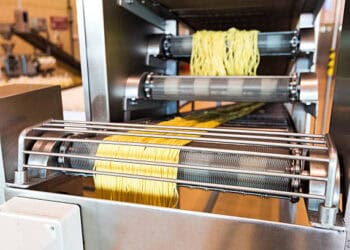 A factory in London is using a machine to produce Andriani gluten-free pasta.