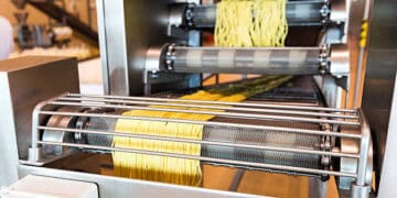 A factory in London is using a machine to produce Andriani gluten-free pasta.