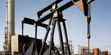 Oil pump jack in an oil field, illustrating recent OPEC supply adjustments and global oil market dynamics. - Supply Chain News