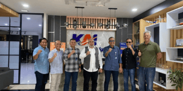 A group of men posing for a photo during an International Trade Council initiative in Indonesia.