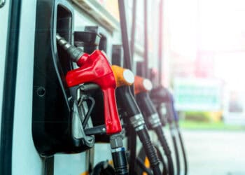 Shell fuel pumps at a gas station facing a decline in profits.