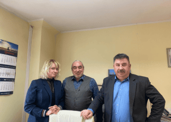 A group of people posing for a picture during a Strategic Global Expansion event.