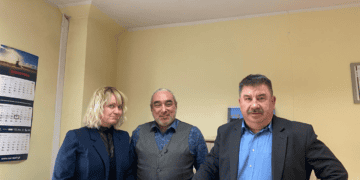 A group of people posing for a picture during a Strategic Global Expansion event.