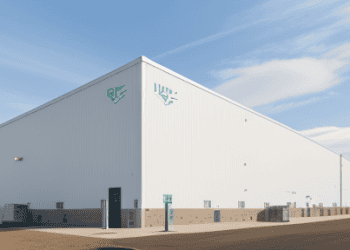 A new advanced cold-storage facility by Lineage Logistics in Hazle Township, showcasing its exterior with a large, modern warehouse design.