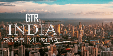 Aerial view of Mumbai skyline at sunset; GTR India 2025 - Supply Chain News
