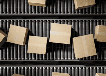 Cardboard boxes on a conveyor belt at TOPACK 2025, India's premier packaging exhibition. - Supply Chain News